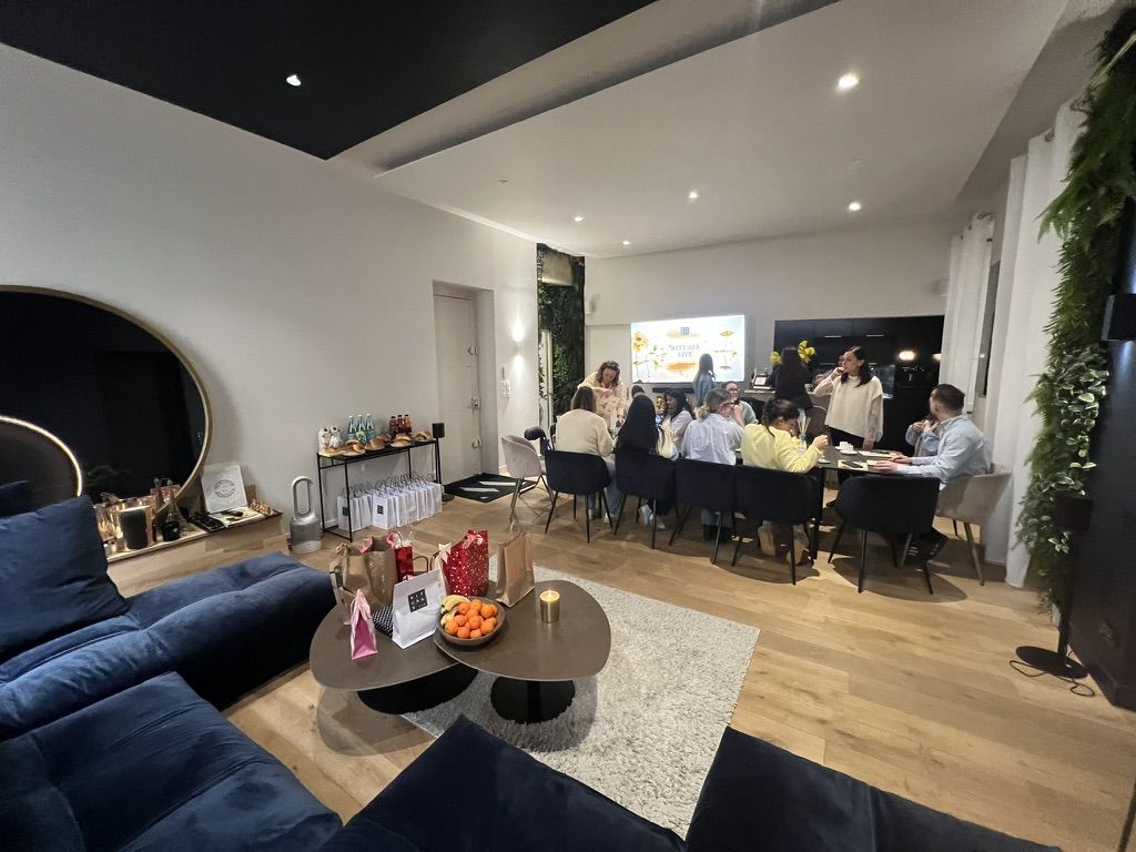 Réunion Rituals France à la WinHome : présentation « Rituals Live » sur l'écran géant, buffet et sacs cadeaux